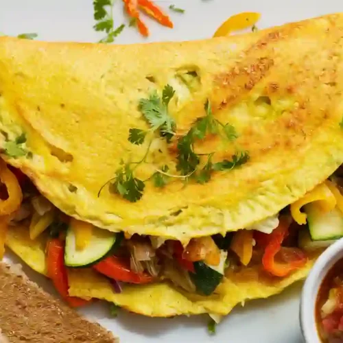 Colorful Veggie Omelet on White Plate